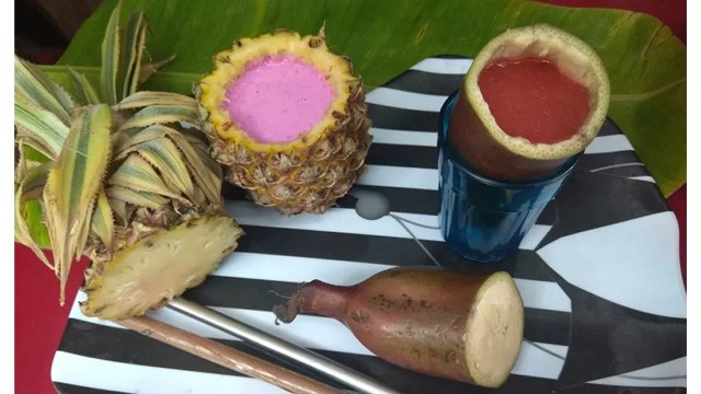 Man makes a small yet significant contribution by serving fruit juices directly in the Fruit Shells