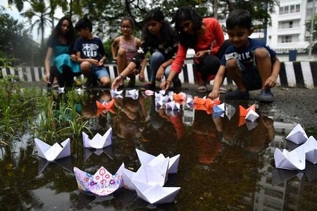 When these paper boats were set to sail in waters during monsoon, the seeds in the paper boats sprout into flowering plants