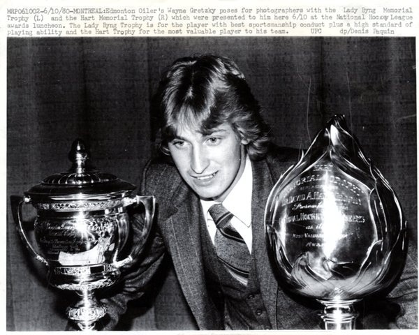 Wayne Douglas Gretzky with Lady Byng Trophy and Hart Trophy