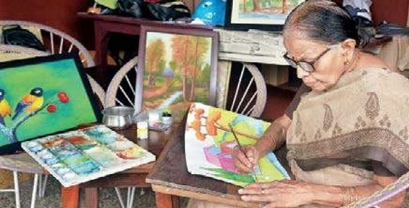 Age is never a bar for Padmini she regularly practices art strokes with brush on paper