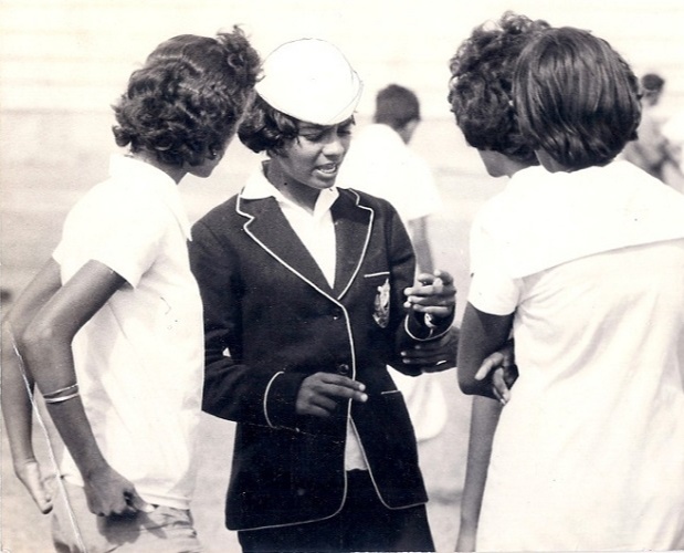 Philo explaining to her relay team how to do a baton change in the 4x100.  1966 Interschool sports, Bangalore.  Philo set new meet records