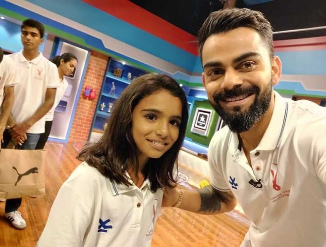 Pooja bishnoi with Virat Kohli