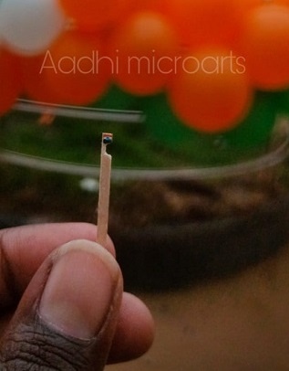 Carving the great Indian tricolour with a height of 4mm and width 3mm on a toothpick Art by Aditya Paladi