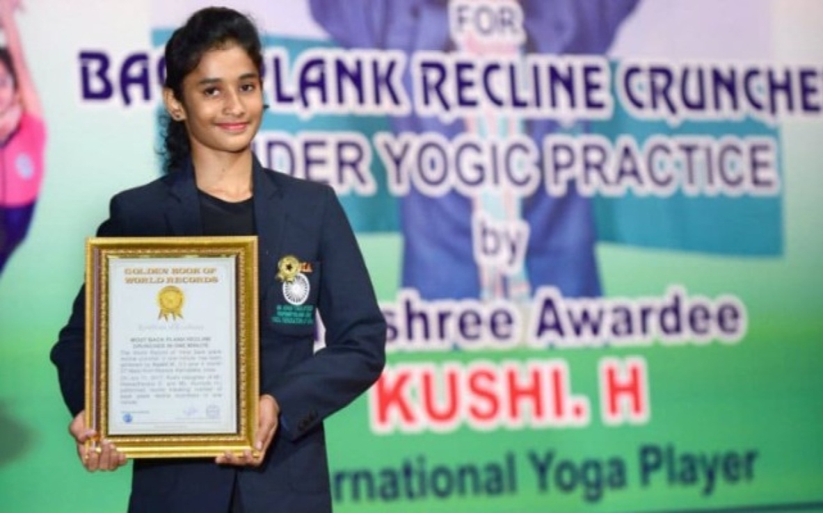 Khushi creating a Golden Record in Performing the Toughest, hardest Yoga asanas - Niraalamba Poorna Chakrasana 15 times under 1 minute while she was only 13 years