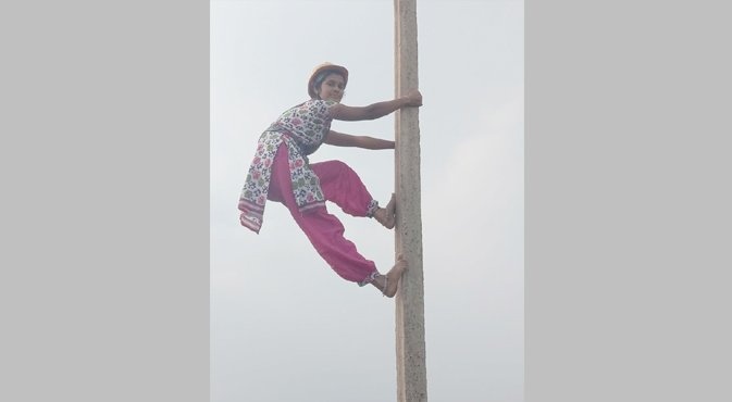 Sirisha climbed up and down the pole in less than a minute