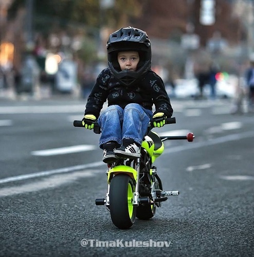 Tima Kuleshov is a 7-years-old sports star from Ukraine who drives a mini car, a motorcycle, skis, and does trampoline