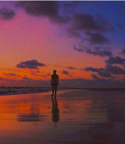 When he turned 16, he got a Redmi note 4 mobile phones and he happened to click the shadow of a boy walking on the beach