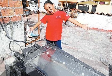 Xóchitl developed a solar water heater from recycled materials and installed it on the roof of her house