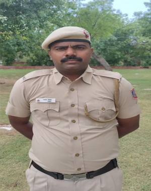 No digital devices but this Constable finds a way to teach kids in the temple.