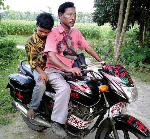 Forest area which doesn't support a four-wheeler ambulance, Karimul thought that a two-wheeler can serve well