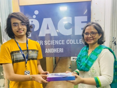 Siddhartha Bhattacharya Received the award from Principal of Pace Junior Science College Dr. Neerja Singh